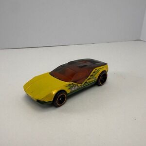 Hot Wheels La Fasta Yellow Green Taxi Service 2008 Mattel Diecast Car 1:64 Scale